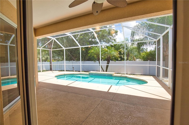 4150 Otoole St, North Port, FL 34291 - view of pool with a patio, a fenced backyard, a ceiling fan, and glass enclosure