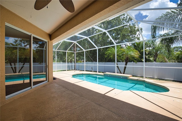 4150 Otoole St, North Port, FL 34291 - view of pool featuring a patio, a fenced backyard, ceiling fan, and a lanai
