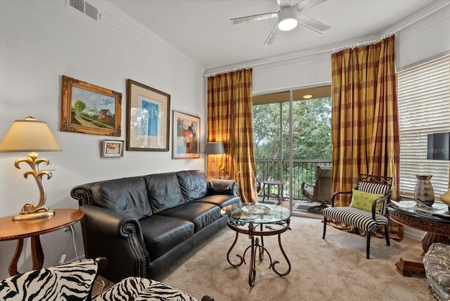 5134 Northridge Rd Unit 303, Sarasota, FL 34238 - carpeted living area with crown molding and ceiling fan