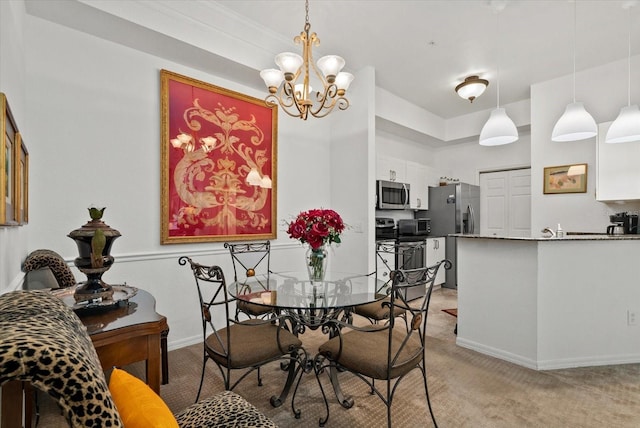 5134 Northridge Rd Unit 303, Sarasota, FL 34238 - dining area with light carpet and a chandelier