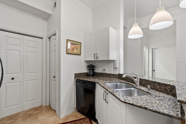 5134 Northridge Rd Unit 303, Sarasota, FL 34238 - kitchen featuring black dishwasher, white cabinets, dark stone countertops, and decorative light fixtures