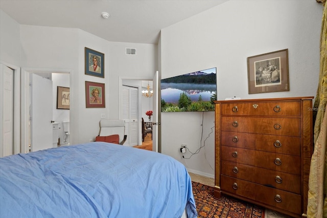 5134 Northridge Rd Unit 303, Sarasota, FL 34238 - bedroom featuring a chandelier and baseboards