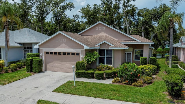 519 Catalina Isles Cir, Venice, FL 34292 - single story home with stucco siding, a garage, a front lawn, and concrete driveway