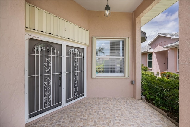 519 Catalina Isles Cir, Venice, FL 34292 - entrance to property featuring stucco siding