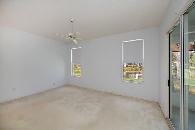 519 Catalina Isles Cir, Venice, FL 34292 - carpeted empty room with ceiling fan