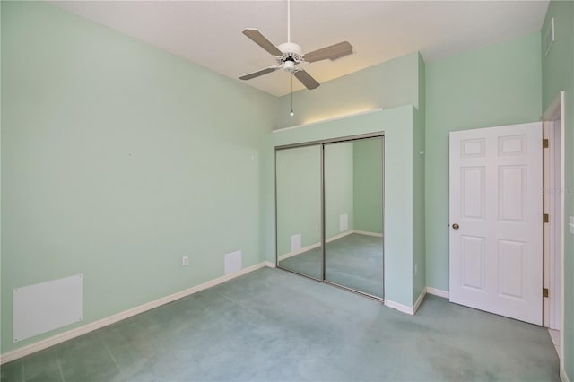 519 Catalina Isles Cir, Venice, FL 34292 - unfurnished bedroom with carpet, a closet, and ceiling fan