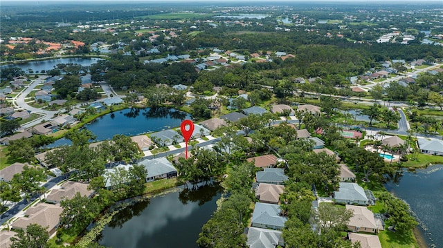 519 Catalina Isles Cir, Venice, FL 34292 - aerial view of property's location with nearby suburban area and a large body of water