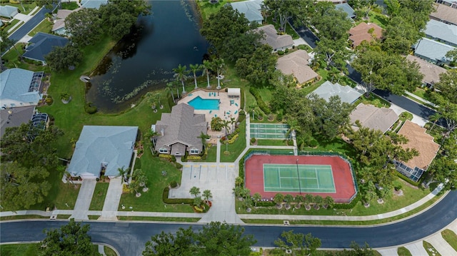 519 Catalina Isles Cir, Venice, FL 34292 - aerial view of property and surrounding area featuring a large body of water and nearby suburban area