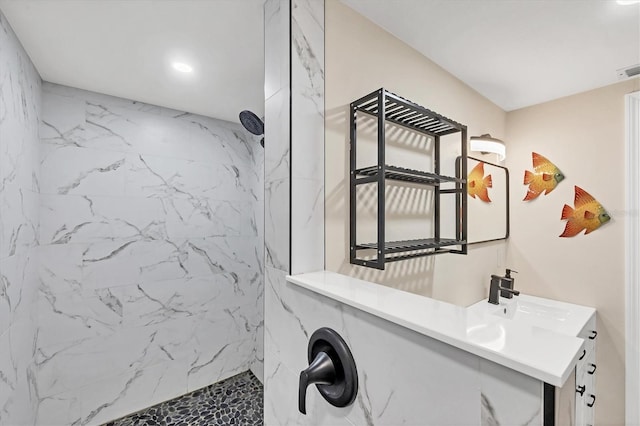 386 Nightingale Rd, Venice, FL 34293 - full bathroom with vanity, a marble finish shower, and recessed lighting