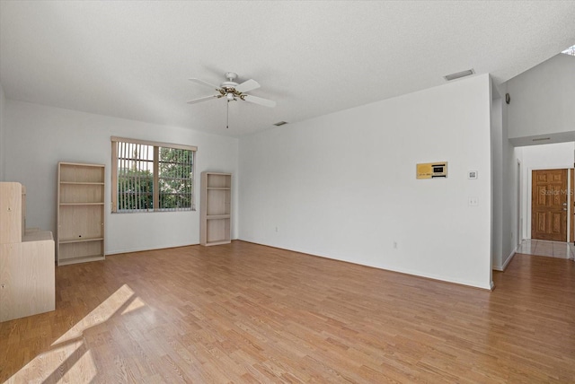 9528 Knightsbridge Cir, Sarasota, FL 34238 - spare room with a ceiling fan and light wood-type flooring