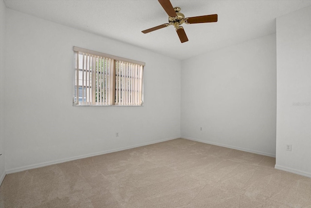 9528 Knightsbridge Cir, Sarasota, FL 34238 - empty room with carpet flooring and a ceiling fan