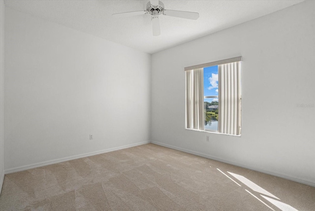 9528 Knightsbridge Cir, Sarasota, FL 34238 - spare room with carpet flooring and ceiling fan