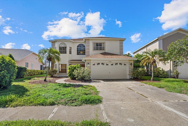 9528 Knightsbridge Cir, Sarasota, FL 34238 - view of front of property with stucco siding, concrete driveway, and an attached garage