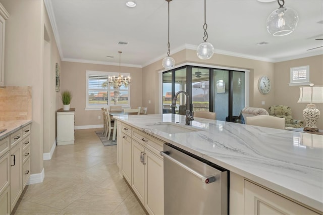 13334 Pacchio St, Venice, FL 34293 - kitchen with dishwasher, a chandelier, light stone counters, pendant lighting, and open floor plan