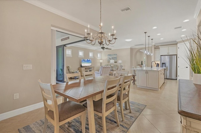 13334 Pacchio St, Venice, FL 34293 - dining room featuring a chandelier, ornamental molding, recessed lighting, light tile patterned floors, and ceiling fan