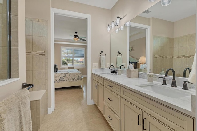 13334 Pacchio St, Venice, FL 34293 - ensuite bathroom featuring double vanity, ceiling fan, and tile patterned flooring