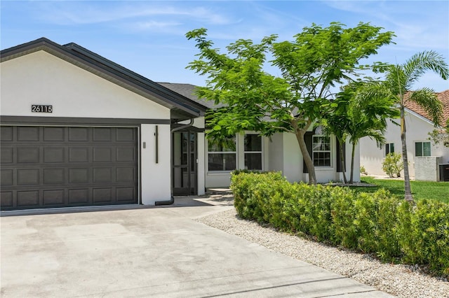 26115 Rampart Blvd, Punta Gorda, FL 33983 - single story home with stucco siding, concrete driveway, and a garage