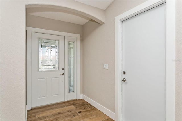 26115 Rampart Blvd, Punta Gorda, FL 33983 - entryway featuring light wood-type flooring and baseboards