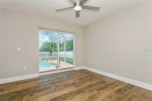 26115 Rampart Blvd, Punta Gorda, FL 33983 - empty room featuring wood finished floors and ceiling fan