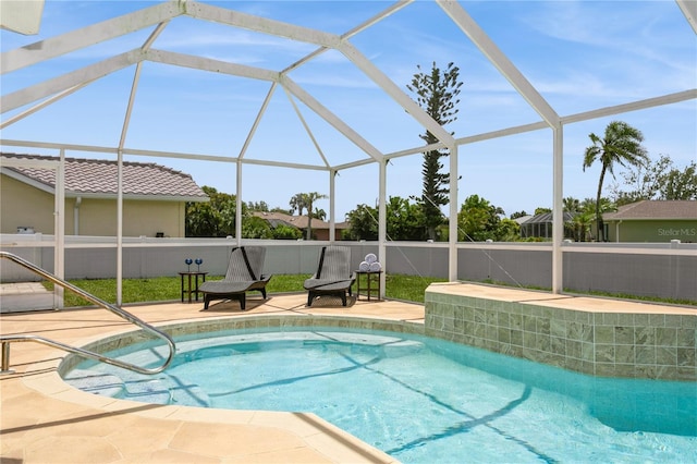 26115 Rampart Blvd, Punta Gorda, FL 33983 - view of pool with a patio, glass enclosure, and a hot tub