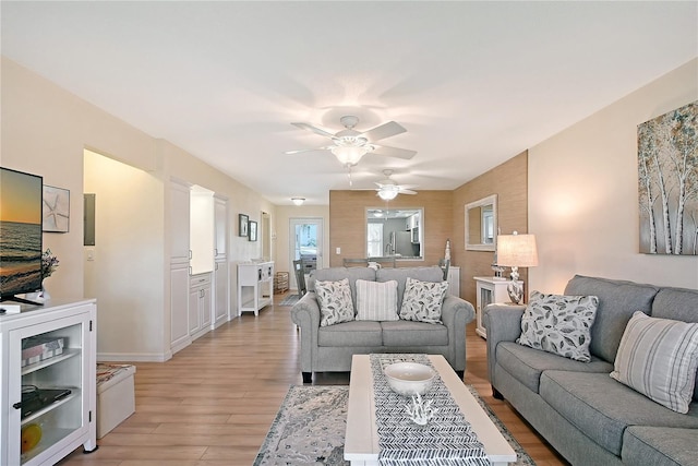 330 Mission Trl N Unit F, Venice, FL 34285 - living area with light wood finished floors and ceiling fan