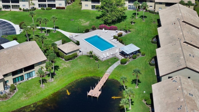 330 Mission Trl N Unit F, Venice, FL 34285 - bird's eye view of a pool and a nearby body of water
