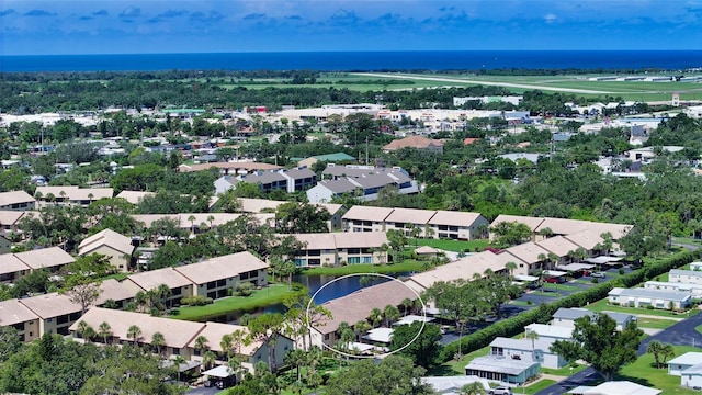 330 Mission Trl N Unit F, Venice, FL 34285 - aerial view of residential area with a large body of water