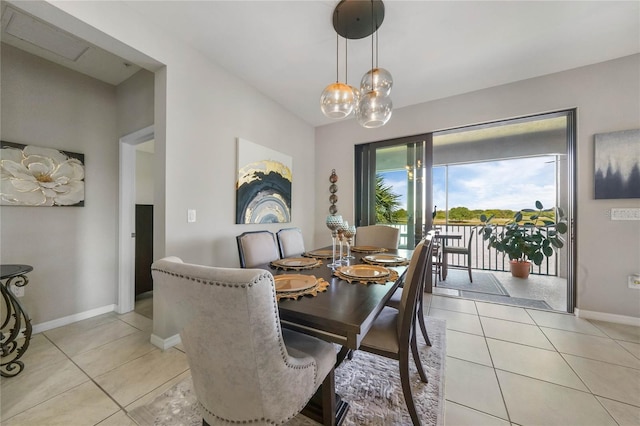 23527 Awabuki Unit 202, Venice, FL 34293 - dining room featuring light tile patterned floors and a chandelier