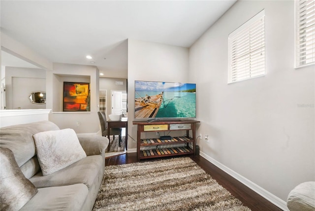 23527 Awabuki Unit 202, Venice, FL 34293 - living area with dark wood-style floors and recessed lighting