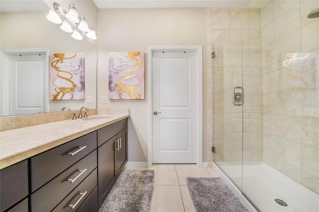 23527 Awabuki Unit 202, Venice, FL 34293 - bathroom featuring vanity, tile patterned flooring, and a stall shower