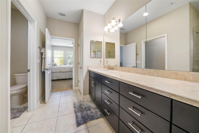 23527 Awabuki Unit 202, Venice, FL 34293 - bathroom with vanity, tile patterned floors, and connected bathroom