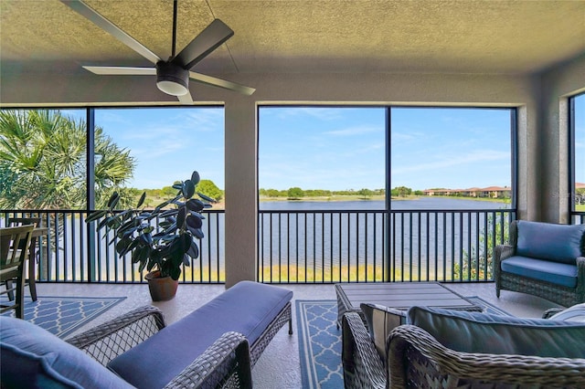 23527 Awabuki Unit 202, Venice, FL 34293 - sunroom / solarium featuring a water view and a textured ceiling