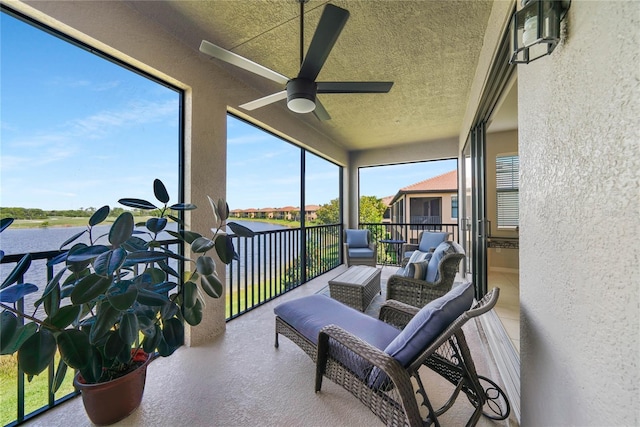 23527 Awabuki Unit 202, Venice, FL 34293 - sunroom with ceiling fan and a water view