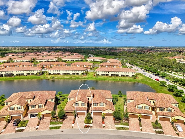 12590 Ghiberti Cir Unit 201, Venice, FL 34293 - aerial perspective of suburban area with a large body of water