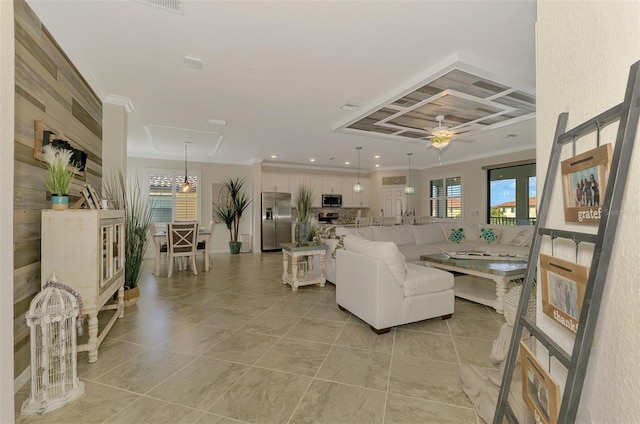 12590 Ghiberti Cir Unit 201, Venice, FL 34293 - living area featuring plenty of natural light, light tile patterned floors, and ceiling fan