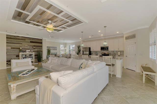 12590 Ghiberti Cir Unit 201, Venice, FL 34293 - living area with ceiling fan, recessed lighting, crown molding, and light tile patterned floors