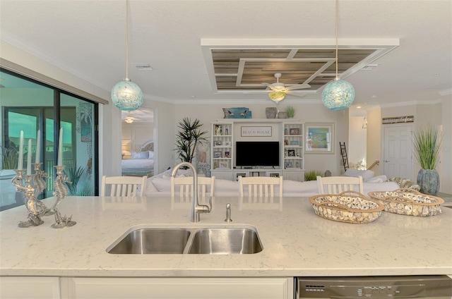 12590 Ghiberti Cir Unit 201, Venice, FL 34293 - kitchen with open floor plan, ornamental molding, ceiling fan, light stone countertops, and decorative light fixtures