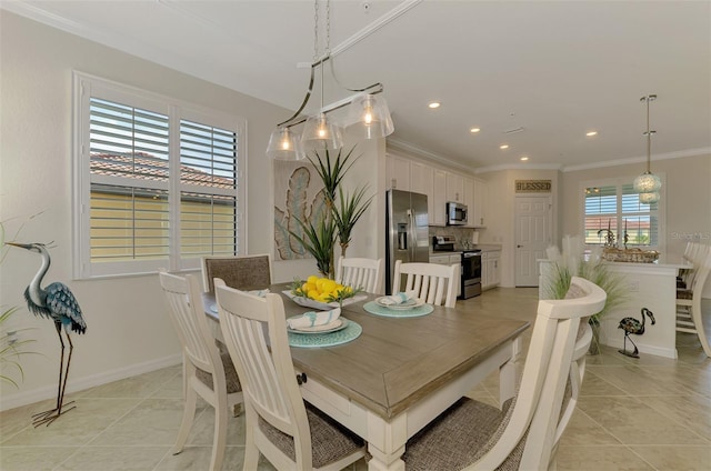 12590 Ghiberti Cir Unit 201, Venice, FL 34293 - dining room with light tile patterned floors, crown molding, and recessed lighting