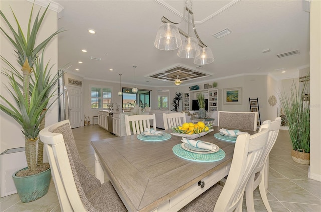 12590 Ghiberti Cir Unit 201, Venice, FL 34293 - dining room featuring light tile patterned floors, crown molding, and recessed lighting