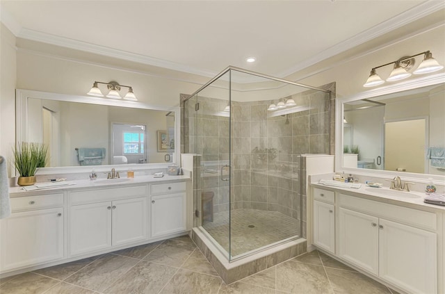 12590 Ghiberti Cir Unit 201, Venice, FL 34293 - bathroom featuring ornamental molding, two vanities, a shower stall, and recessed lighting
