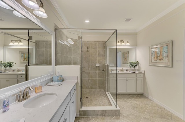 12590 Ghiberti Cir Unit 201, Venice, FL 34293 - bathroom featuring a stall shower, two vanities, crown molding, and tile patterned floors