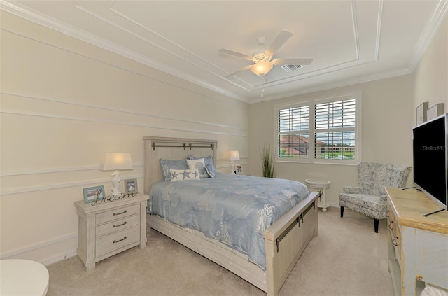 12590 Ghiberti Cir Unit 201, Venice, FL 34293 - bedroom featuring light carpet, crown molding, and a ceiling fan