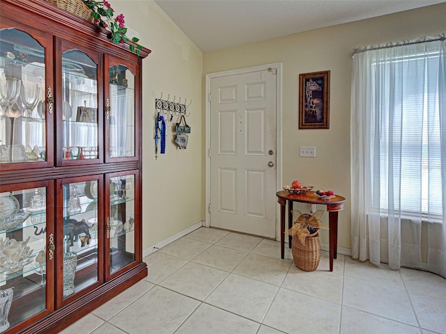 3139 Point St, North Port, FL 34286 - entrance foyer featuring light tile patterned floors