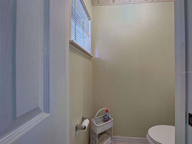 3139 Point St, North Port, FL 34286 - bathroom with toilet and baseboards