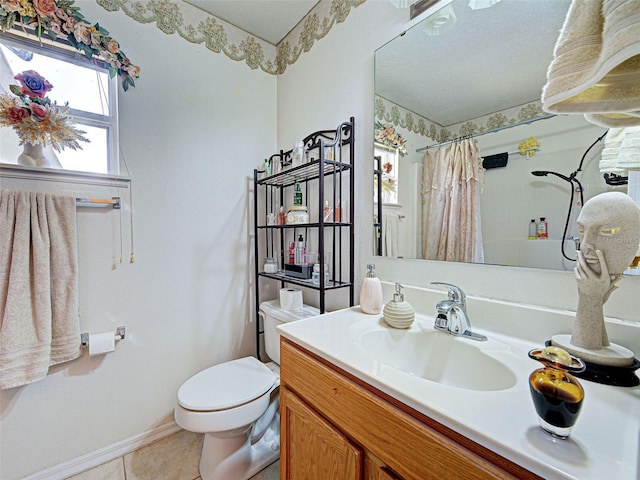 3139 Point St, North Port, FL 34286 - bathroom with vanity, a shower with shower curtain, and tile patterned floors
