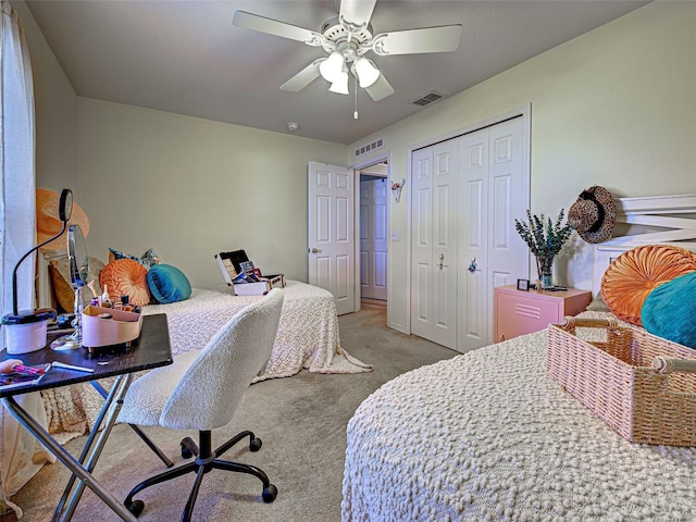 3139 Point St, North Port, FL 34286 - bedroom with carpet flooring, a closet, and ceiling fan