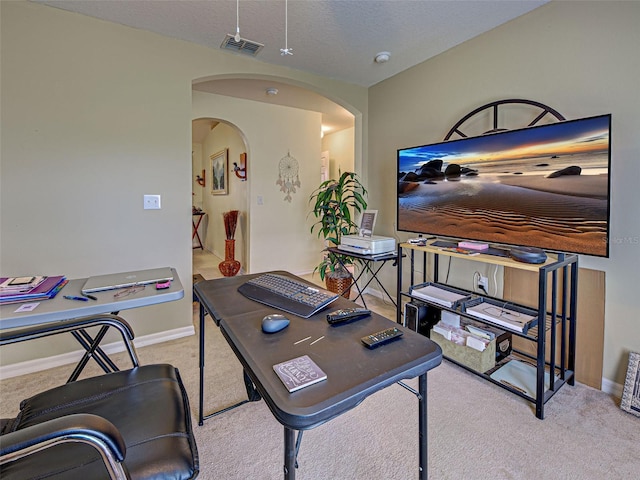 3139 Point St, North Port, FL 34286 - office with arched walkways and light carpet