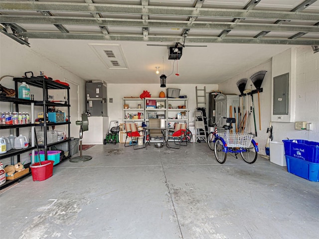 3139 Point St, North Port, FL 34286 - garage with electric panel and a garage door opener