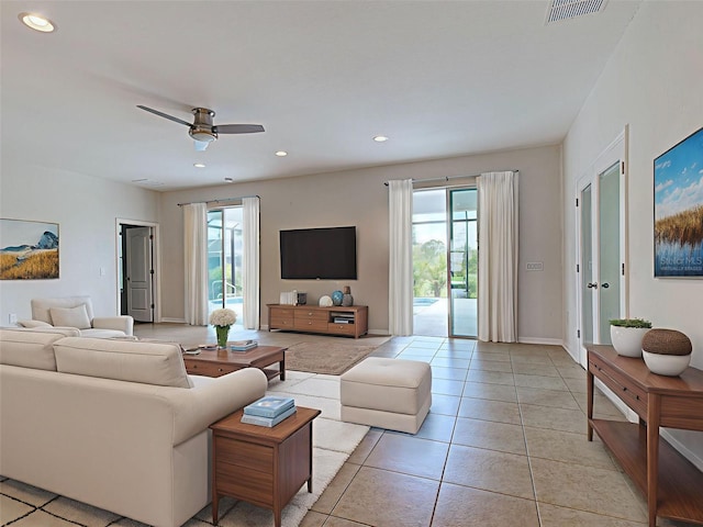 9157 Genesee St, Port Charlotte, FL 33981 - living room featuring recessed lighting, a ceiling fan, and light tile patterned floors