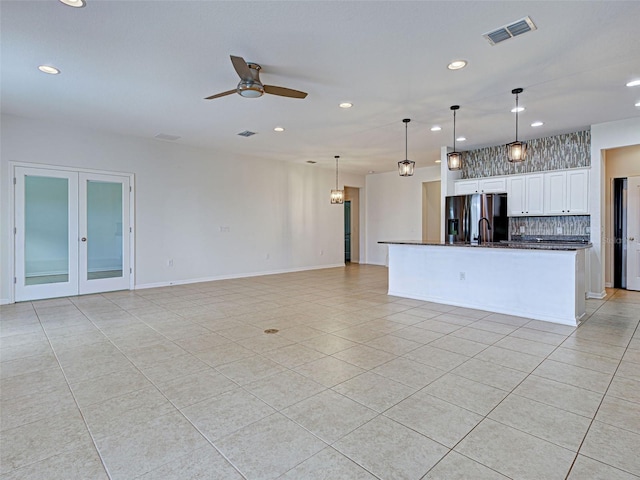 9157 Genesee St, Port Charlotte, FL 33981 - unfurnished living room featuring recessed lighting, ceiling fan, light tile patterned floors, and french doors
